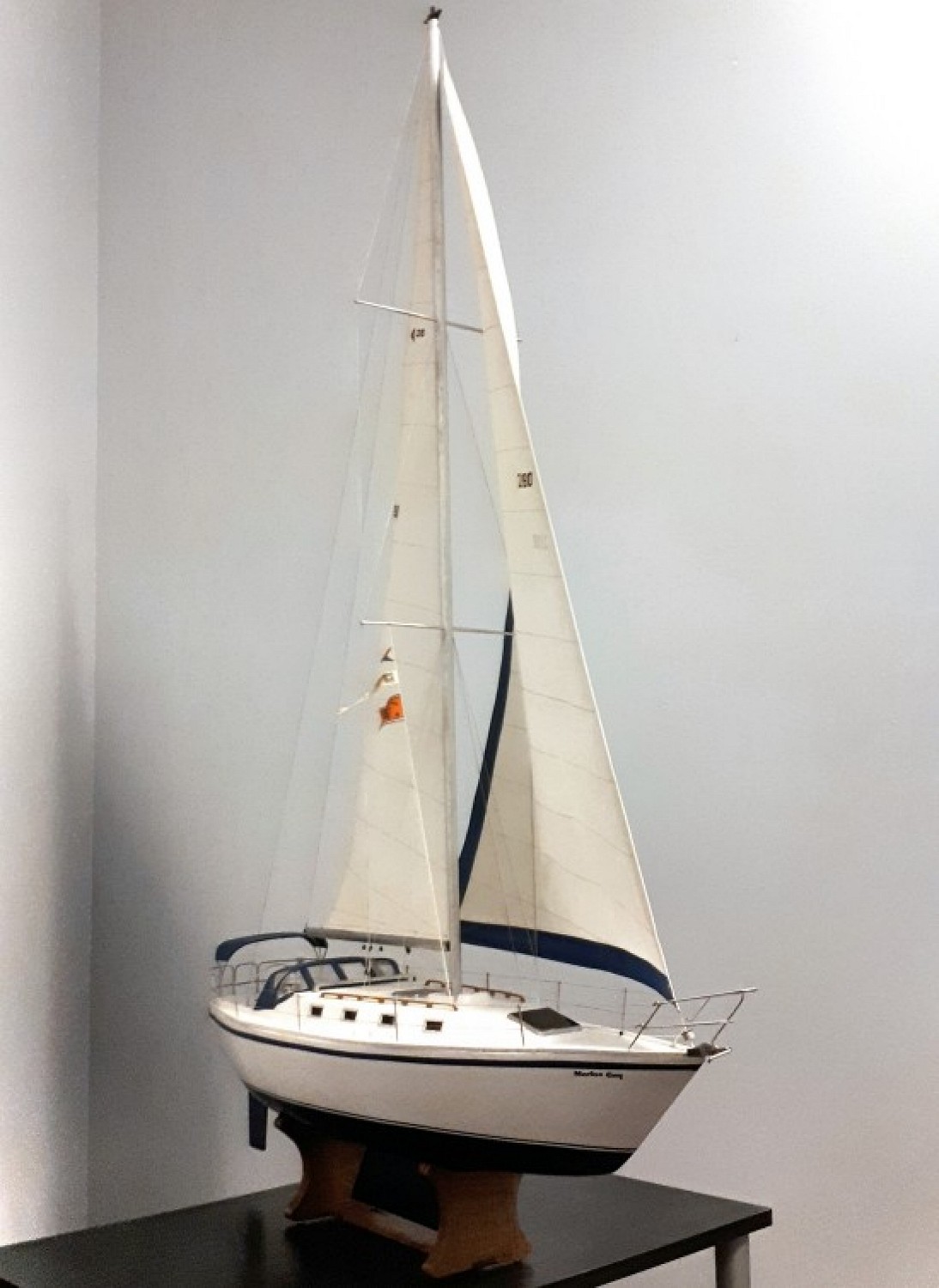 Image of model yacht - full sail
