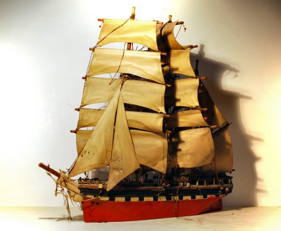 Model ship before restoration